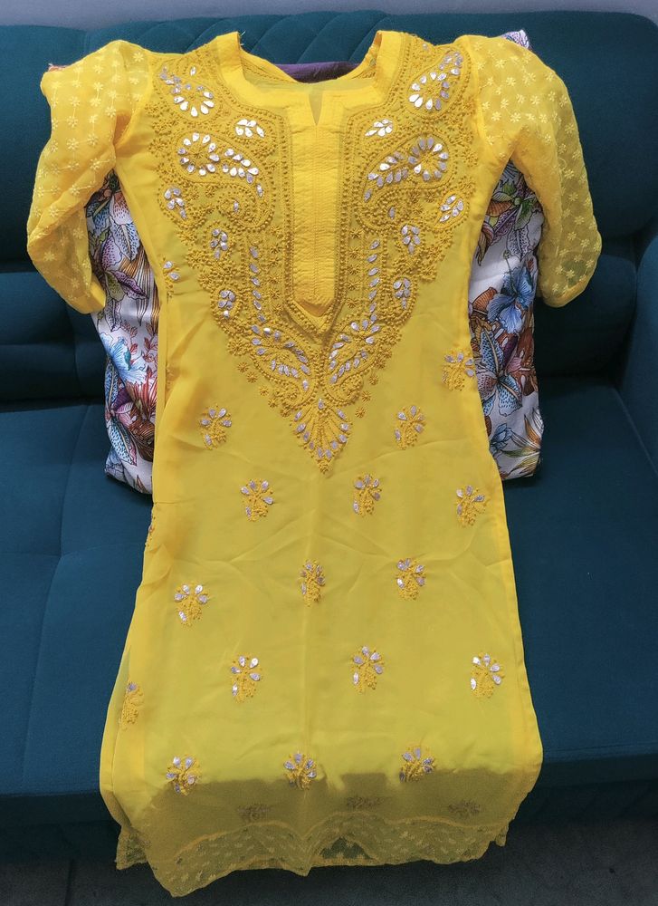 Yellow Chikankari Kurta And White Flared Palazzo