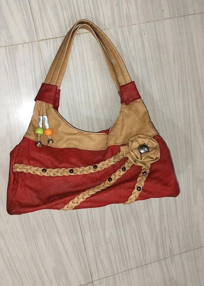 Beautiful Red Coloured Hand Bag In Good Condition