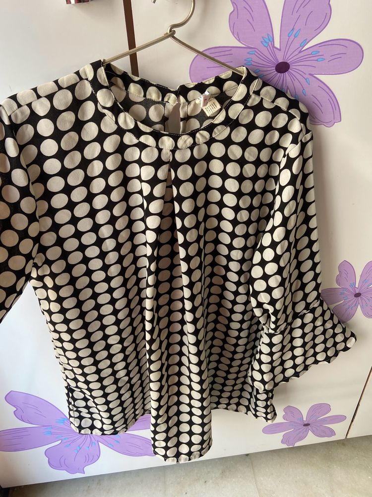 designer polka dot top