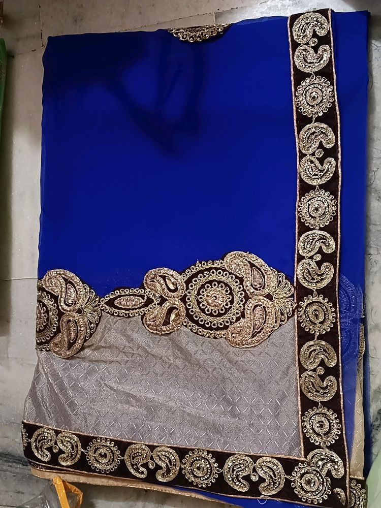 You Are Free To Offer Blue Saree With Broad Lace