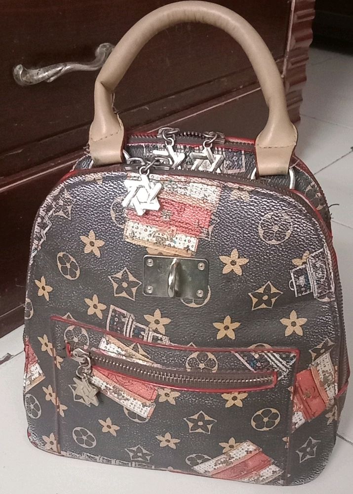 LV Brown Leather Small Backpack cum hand bag...