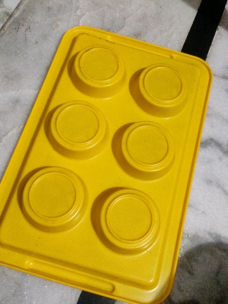 Yellow plastic tray