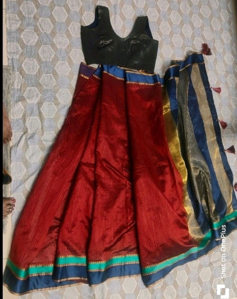 Maroon Saree With Sleevless Blouse