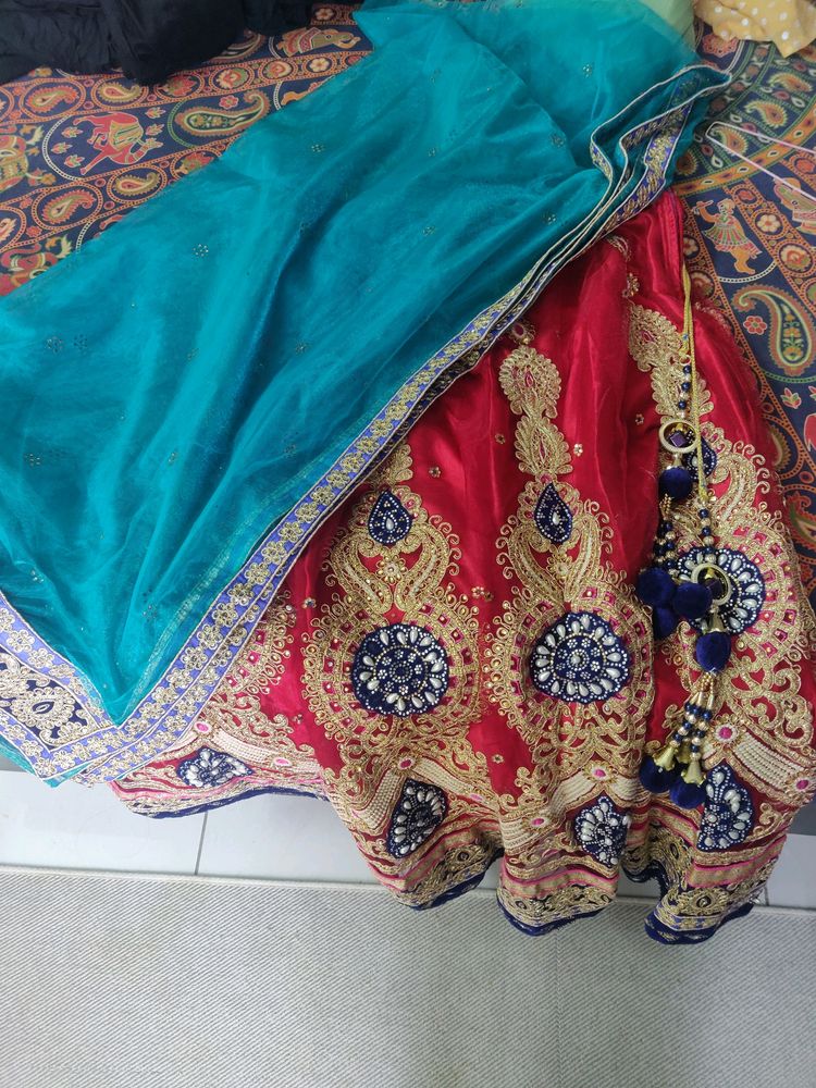 Red Heavy Work Lehenga