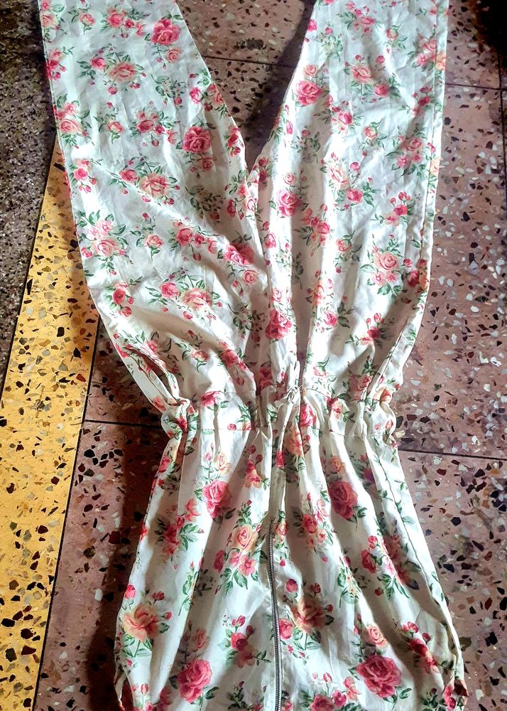 It's a Used Jumpsuit with foral Print...