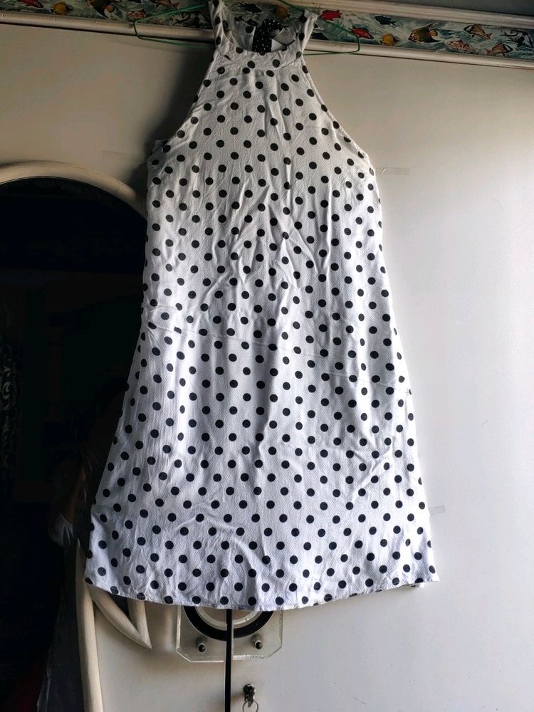 white and black polka dot mini dress