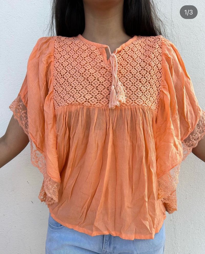 Beautiful Orange Top With Unique Hand Design