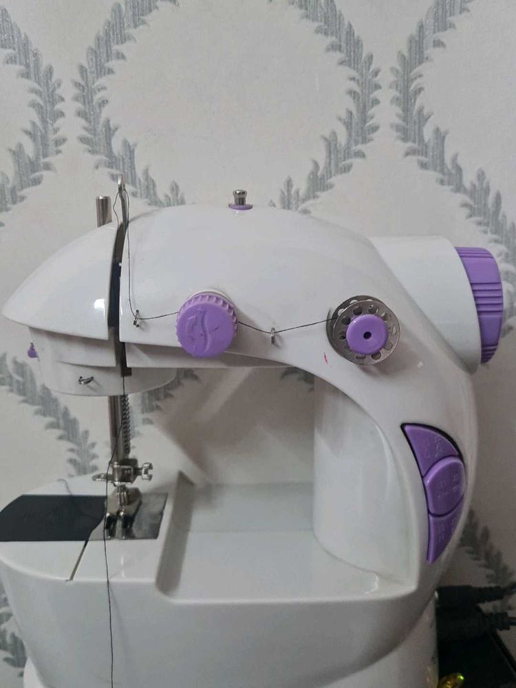 Mini Sewing Machine.