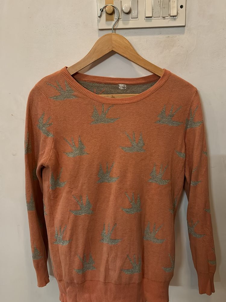 Orange Sweater With Silver Bird Print