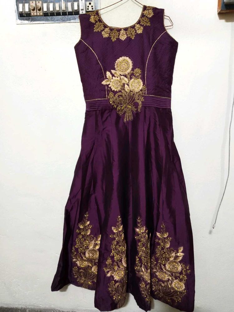 Elegant Purple Gown with Golden Floral Embroidery