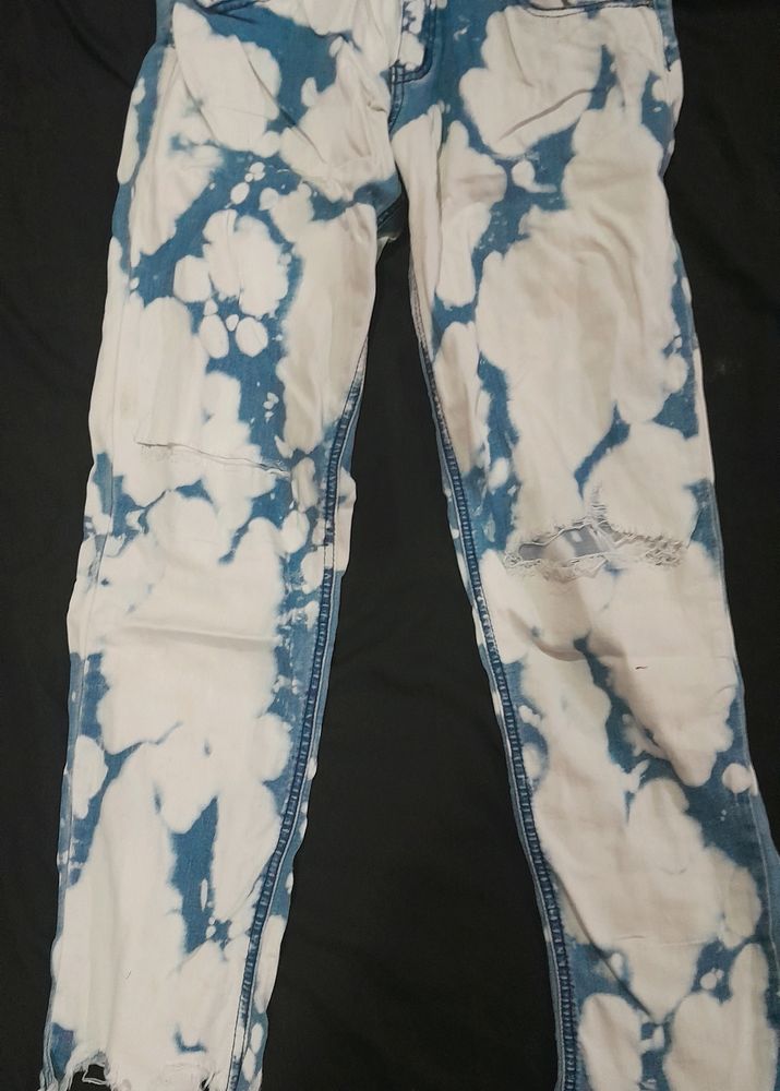 Ripped Cow Print Jeans