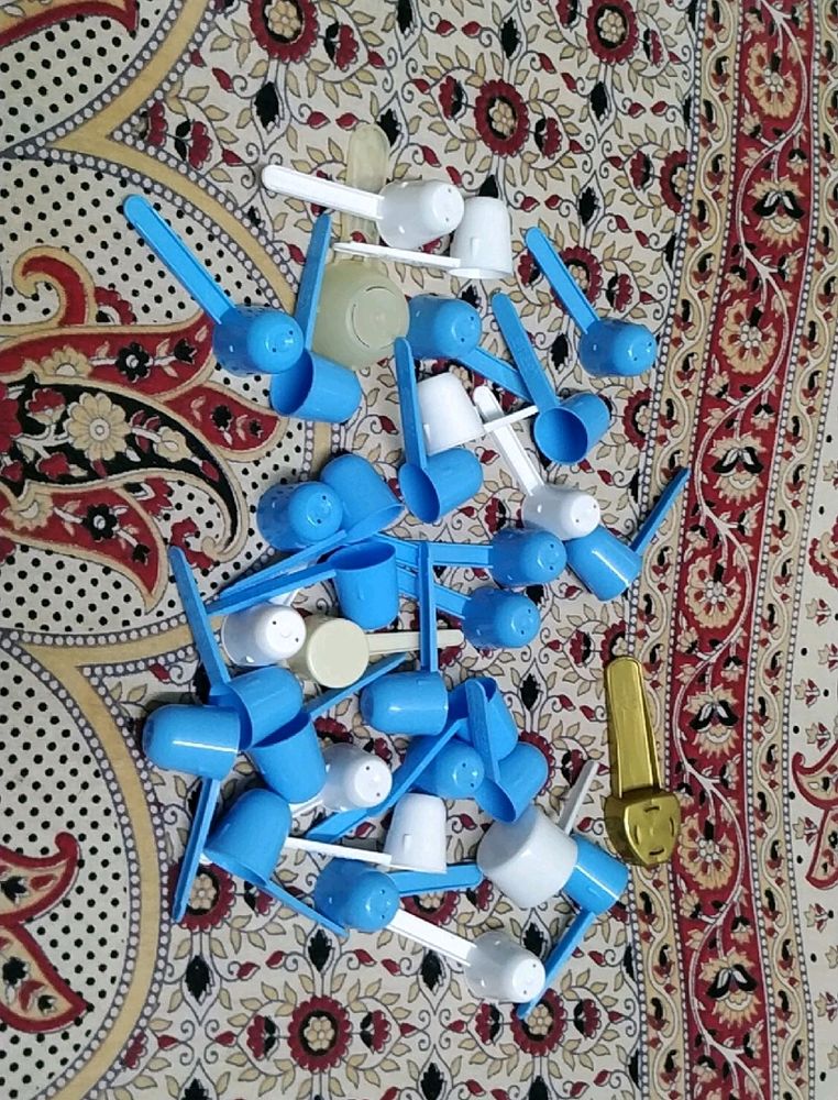 41 Unused Plastic Spoons