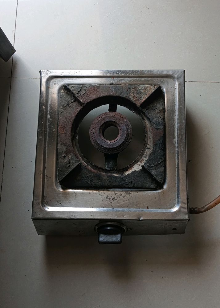 Old Gas Stove With Pipe