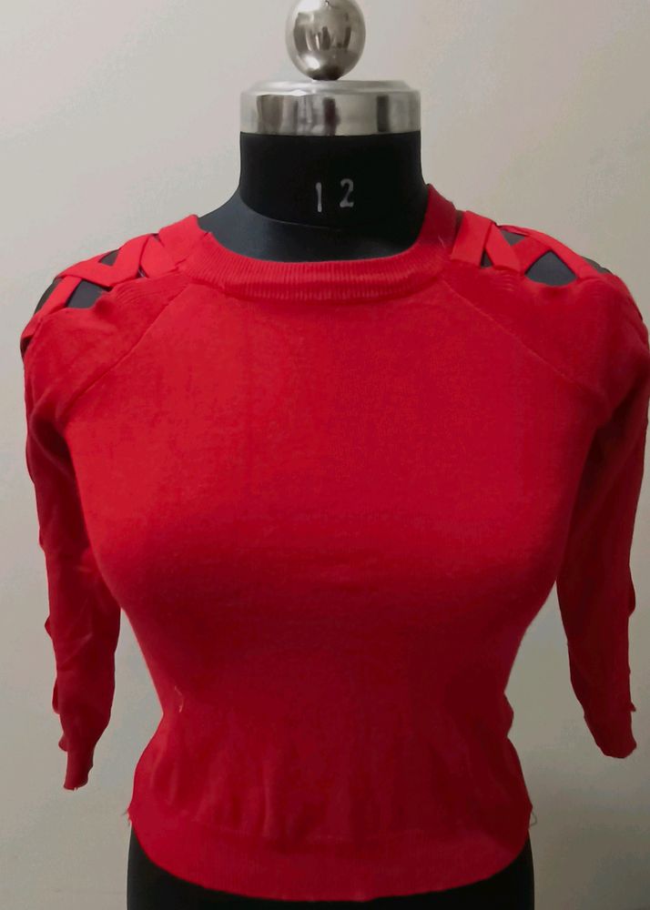 top in red colour with designer sleeves