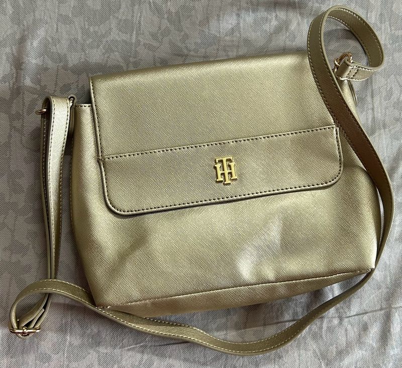 Chic And Spacious Gold Sling Bag