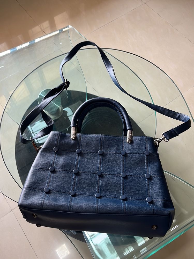 Elegant Blue Textured Spacious Handbag