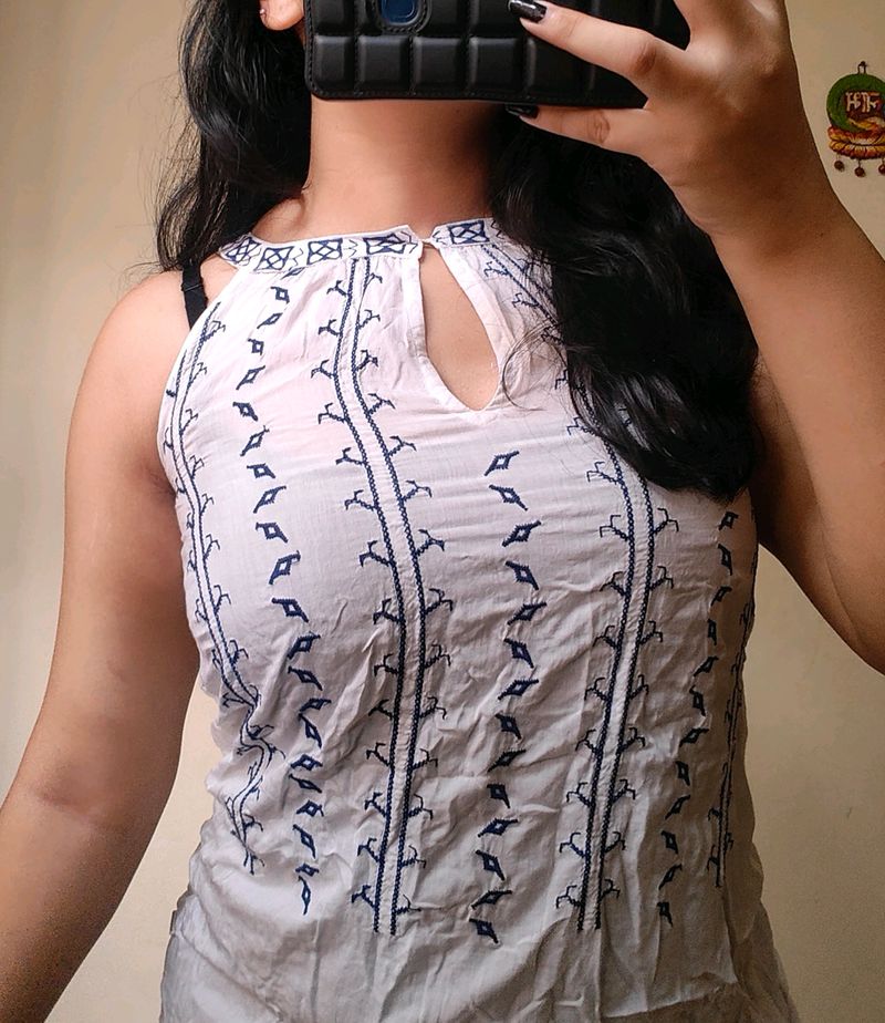 white halter top with blue embroidery 𐙚