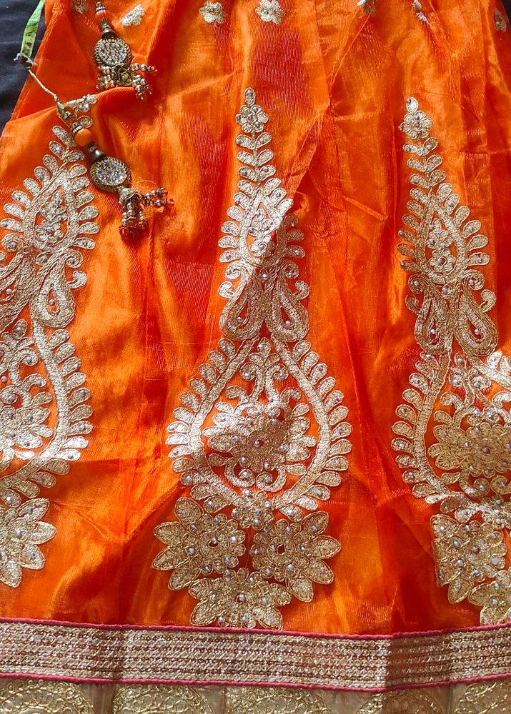 Selling Lehnga With Orange And Golden Colour