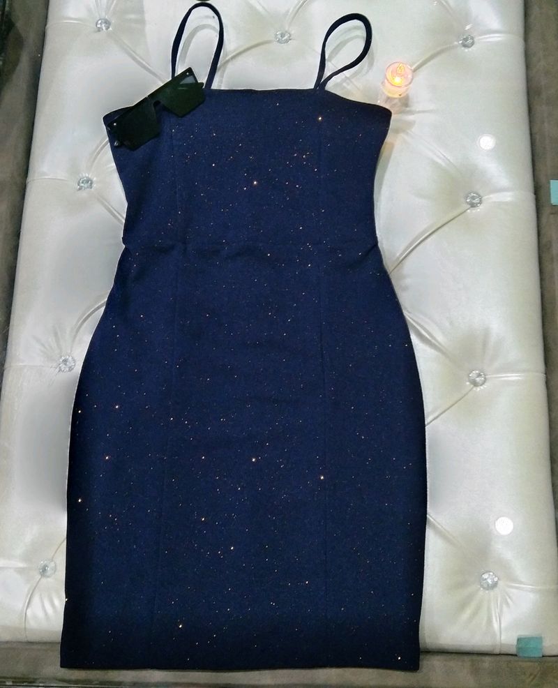 A navy blue coloured bodycon mini dress