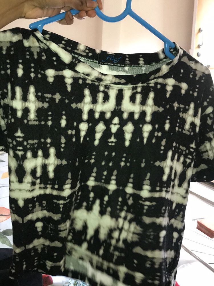 a Black charcoal tie dye type Crop Top