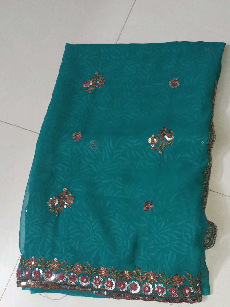 Good looking Sea Green Georgette Saree