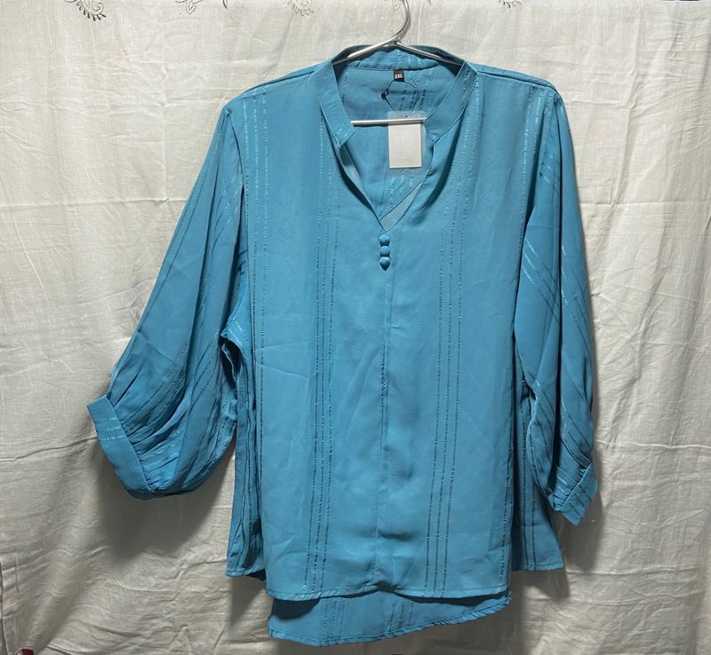 Light teal blue colour top, fresh piece with tags