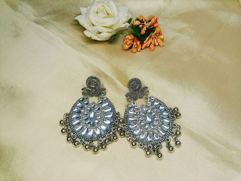 silver colour earrings