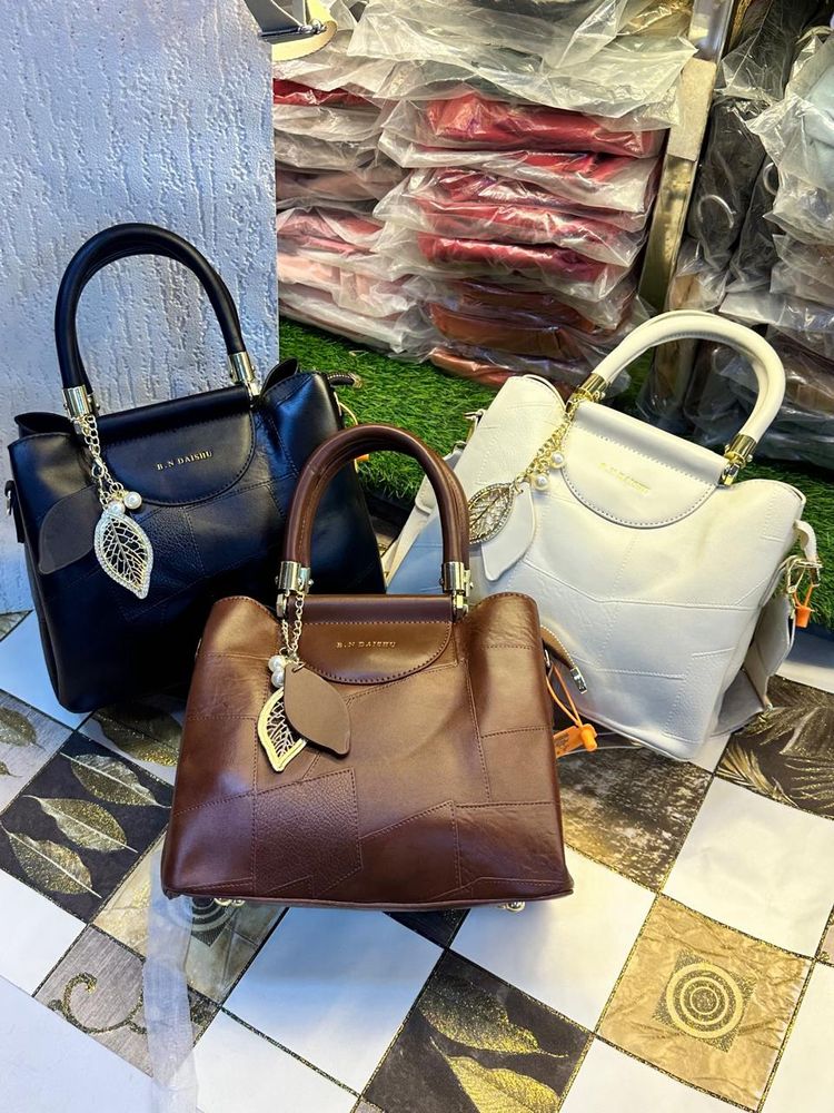 Handbags In Three Different Shades