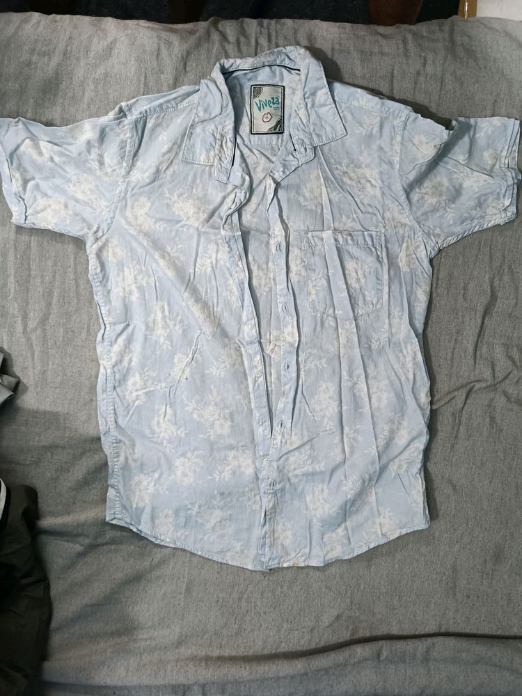 A Light Blue Color Shirt