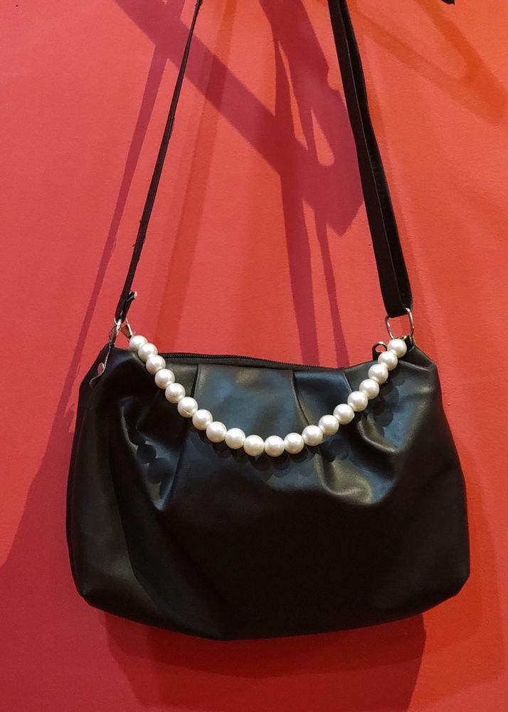 Black Sling Back With Pearl Strap Attachment