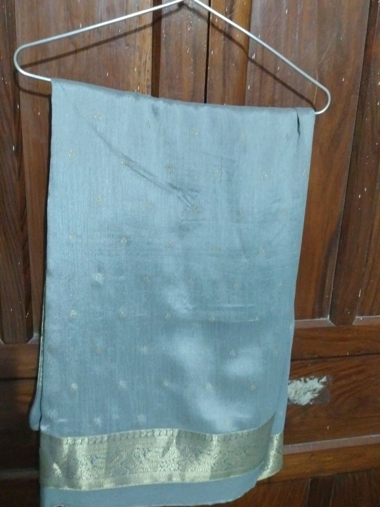 Grey Colour Saree With Golden Border