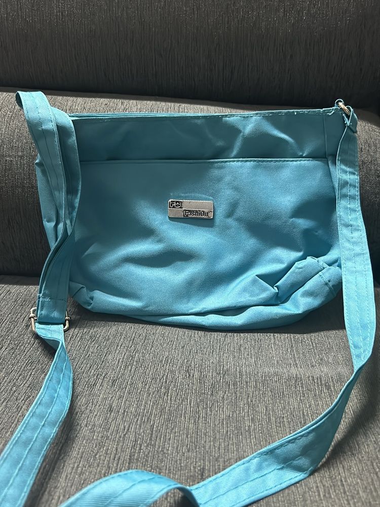 Brand New Sky Blue Sling Bag With 2 Compartments