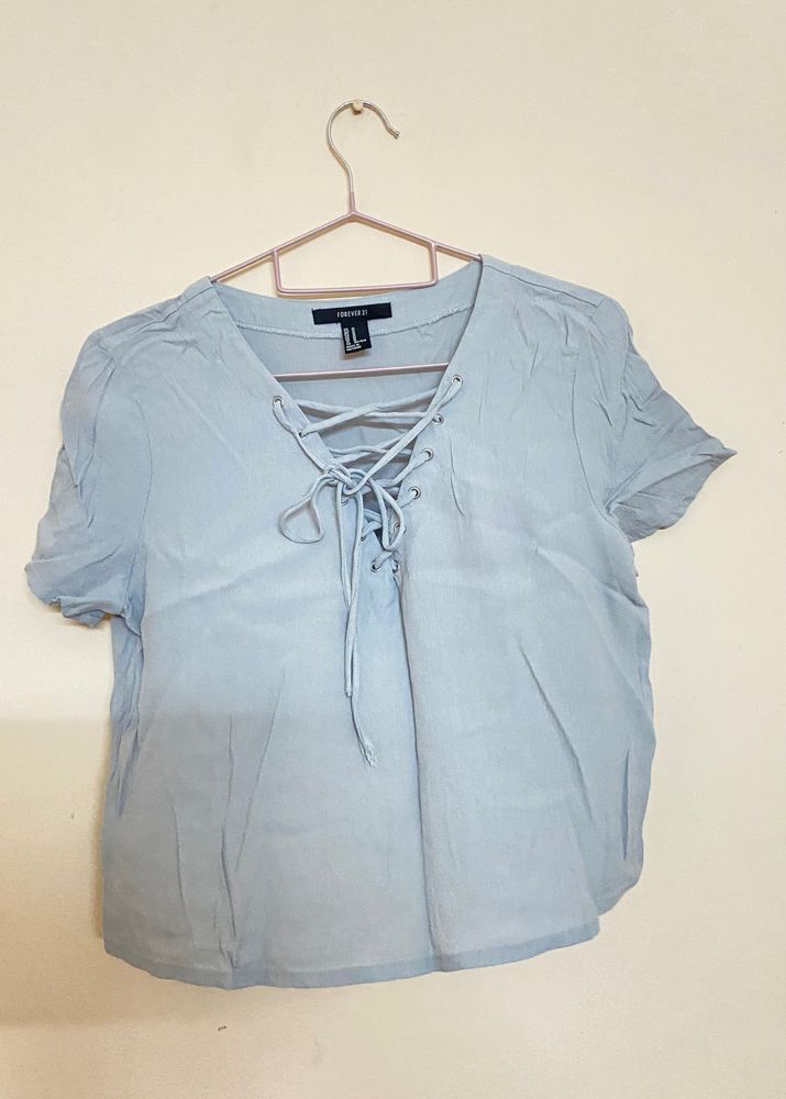 Brand- Forever21, cute top with front tie up, colo