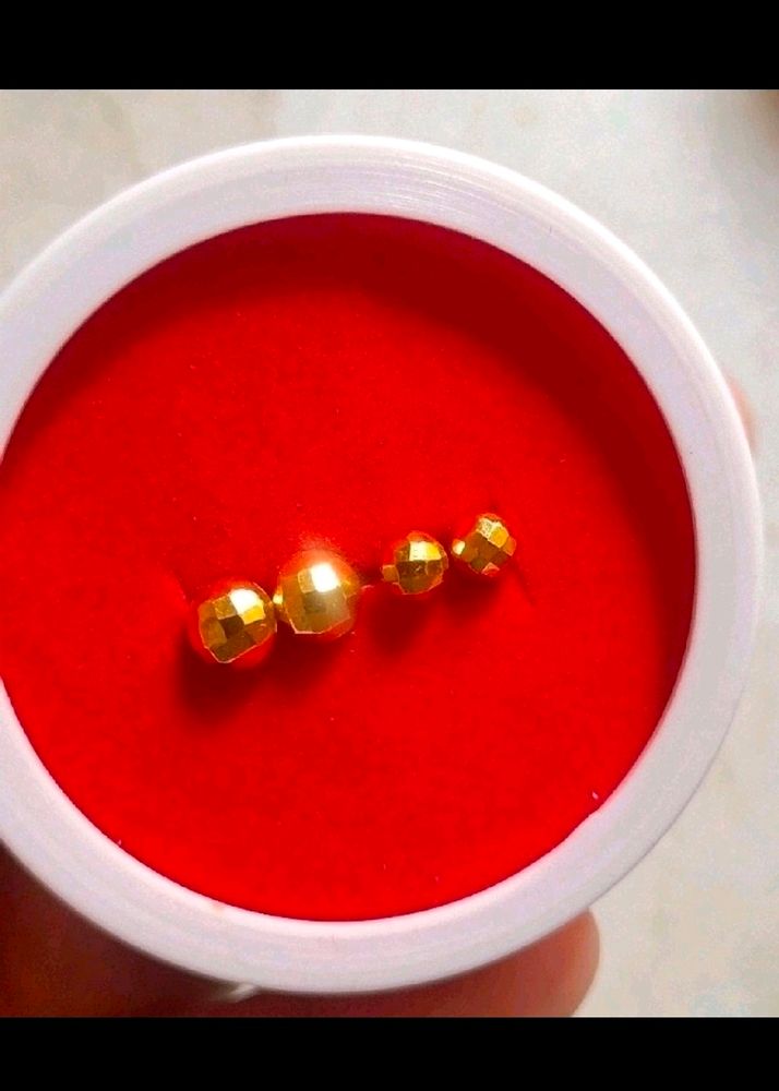 Two Pair Of Gold Earrings