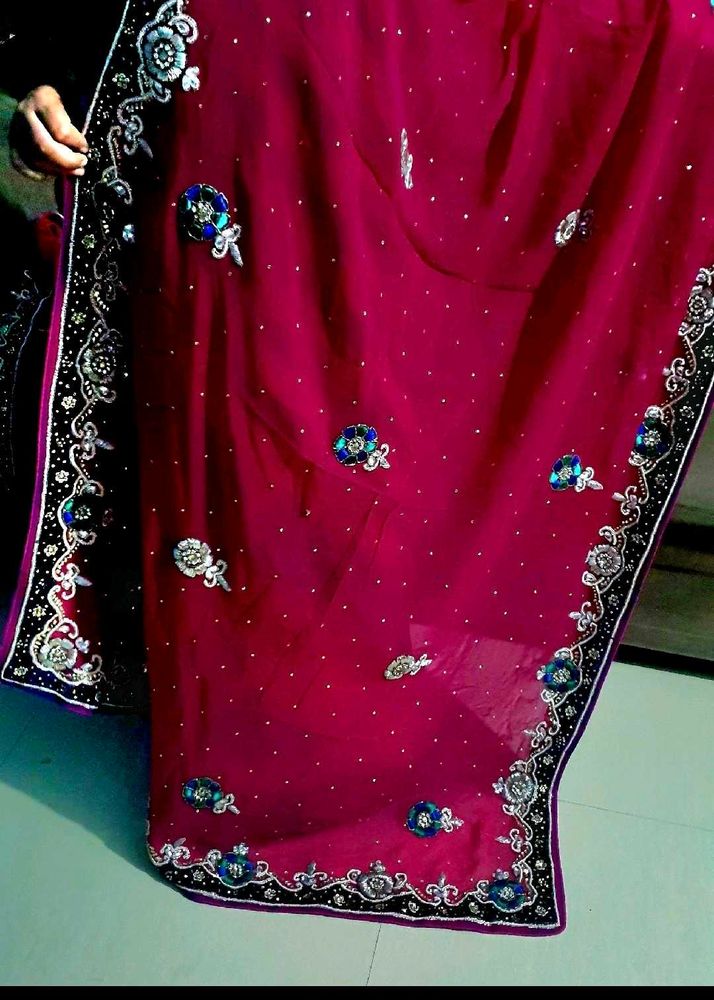 Beautiful heavy Rani pink saree