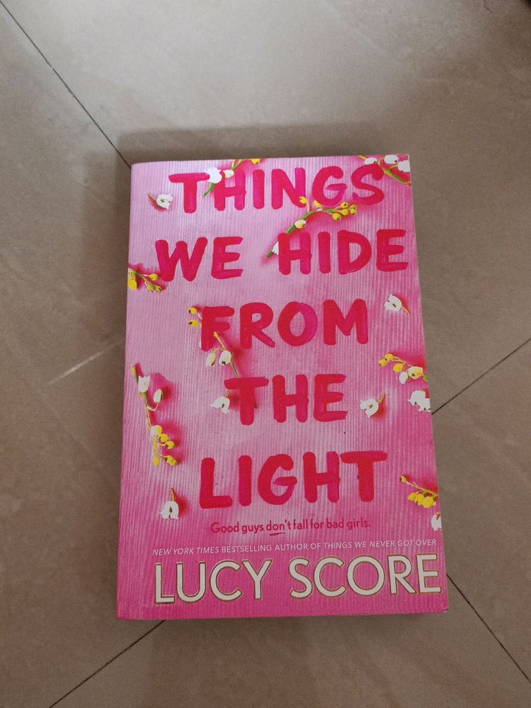 Thing We Hide From The Light By Lucy Score