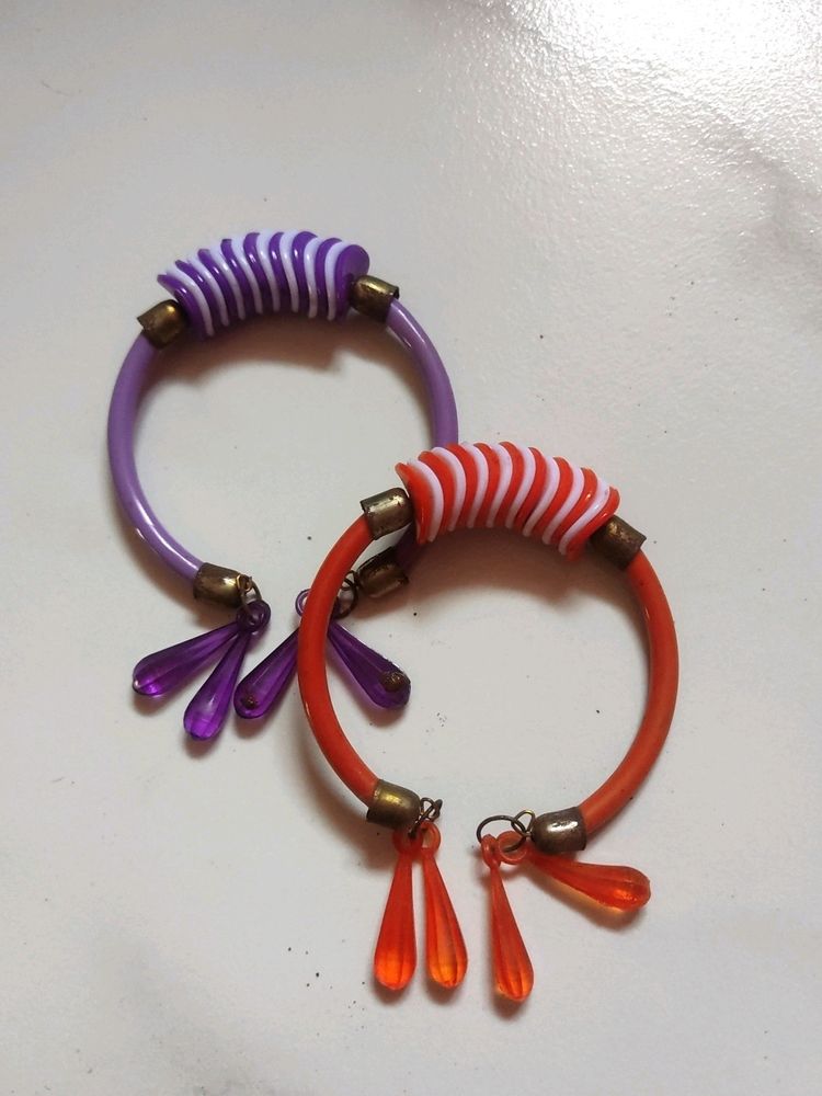 2 Piece Of Purple And Orange Coloured Bracelet