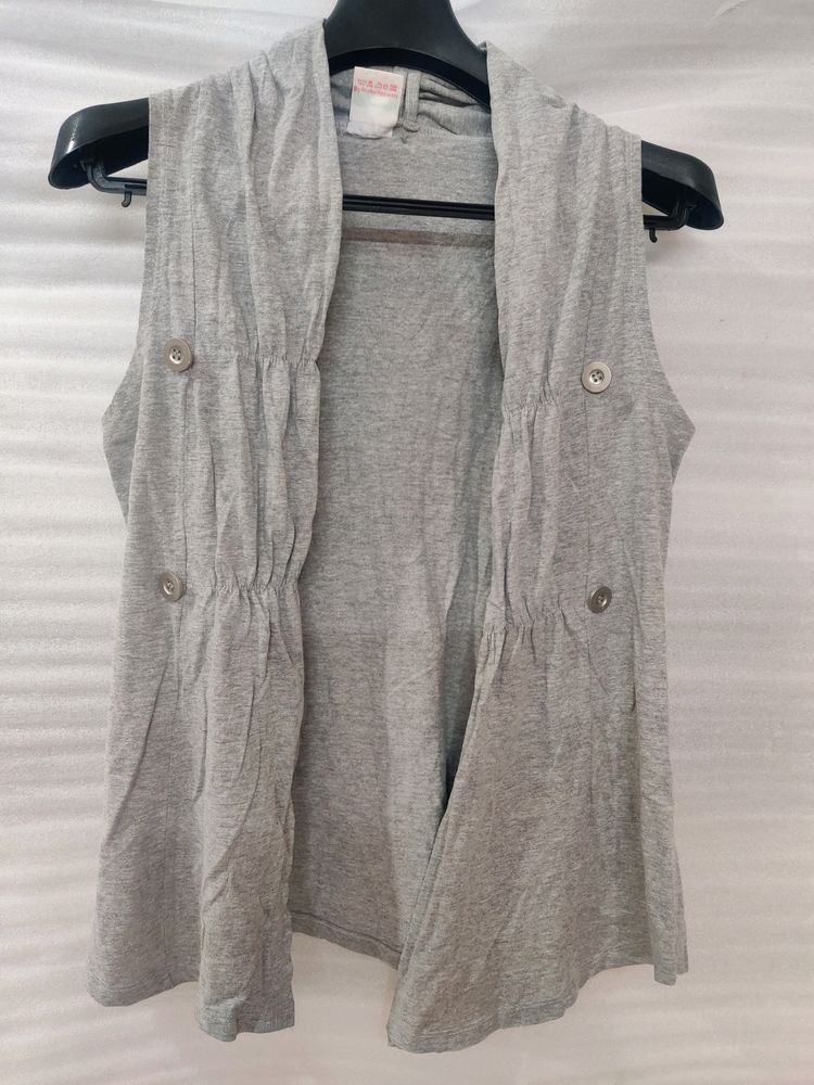 Grey Sleeveless Shrug With Button Holds