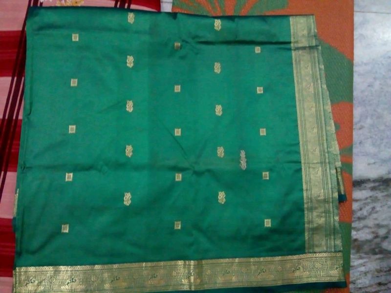 Festive Wear pure green silk sareee