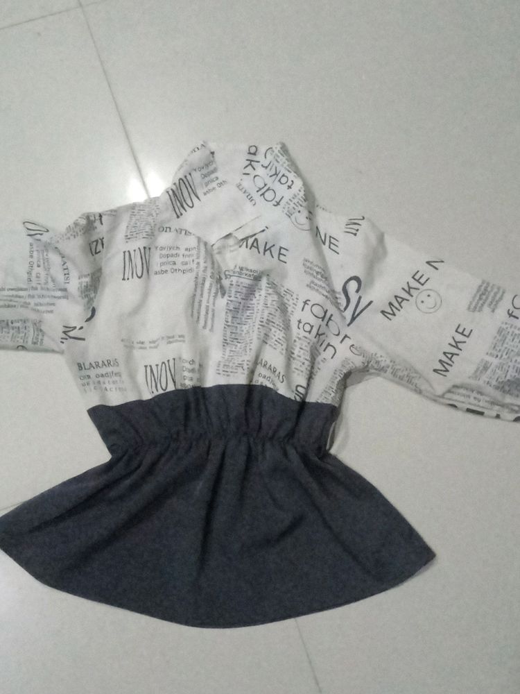 A Elegant "Newspaper" Top