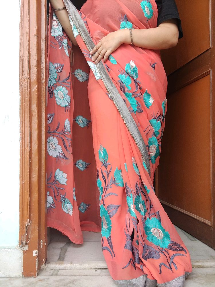 Peach Coloured Saree With Stitched Blouse