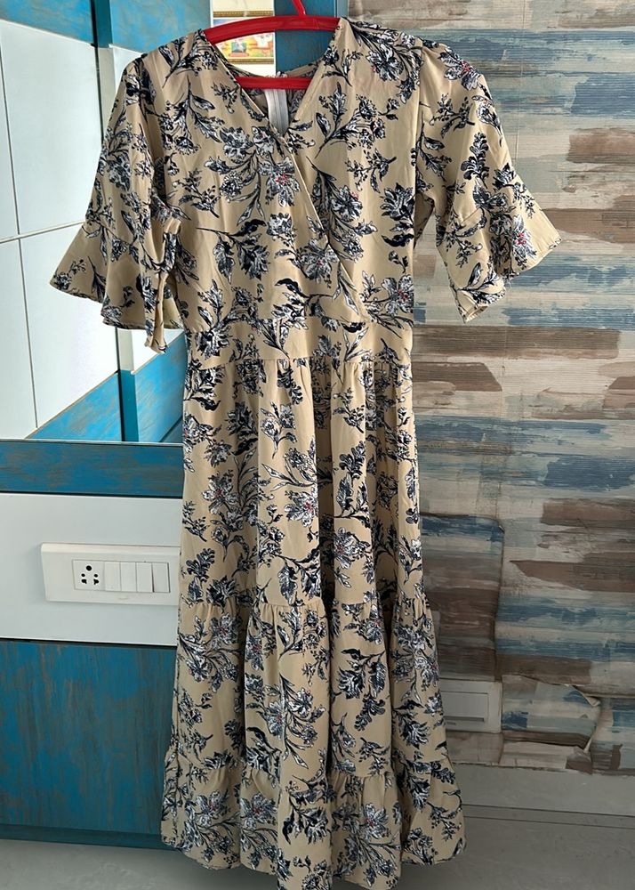 Nude colour dress with floral bouquet print