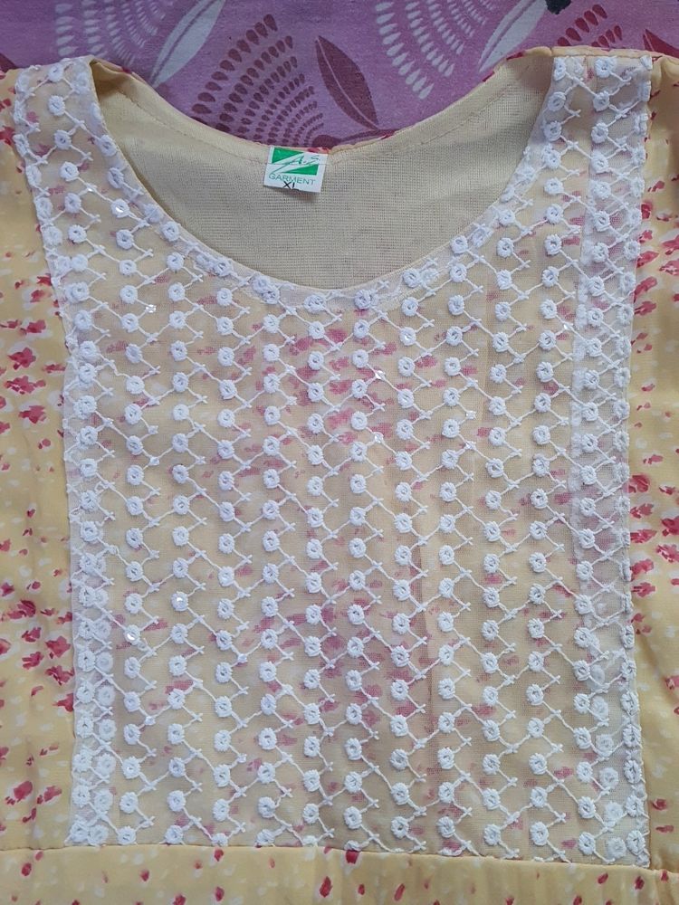 Yellow Kurti With Pink Details And White Chamkas