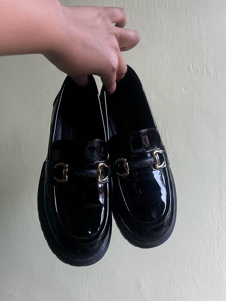 Black Heeled Loafer