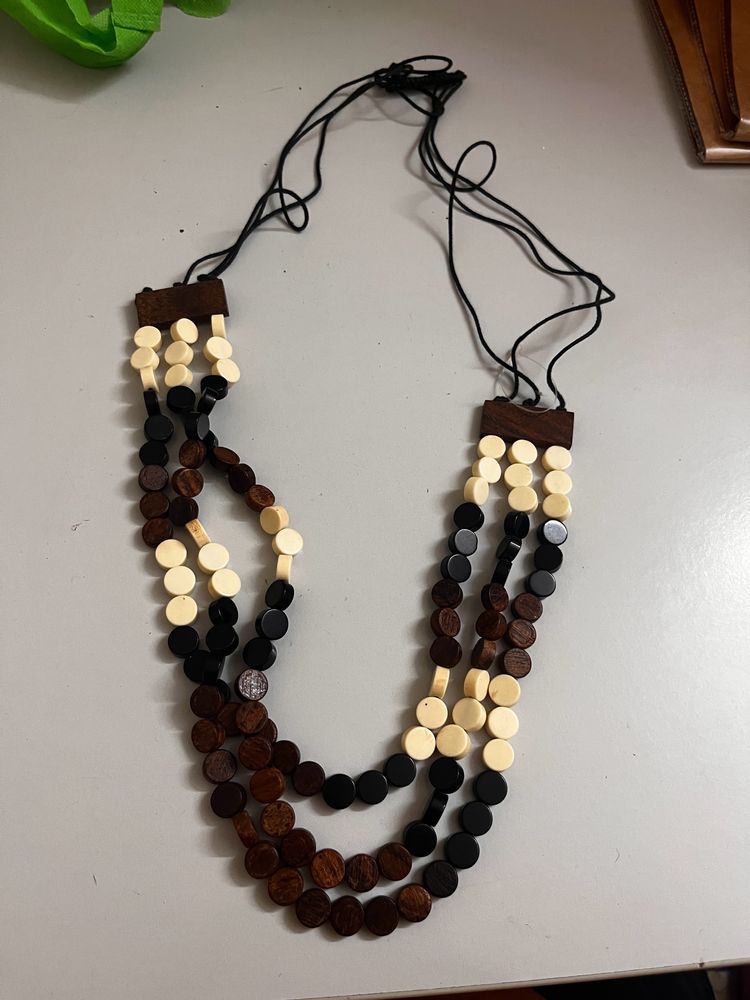 Long wooden three layered chain