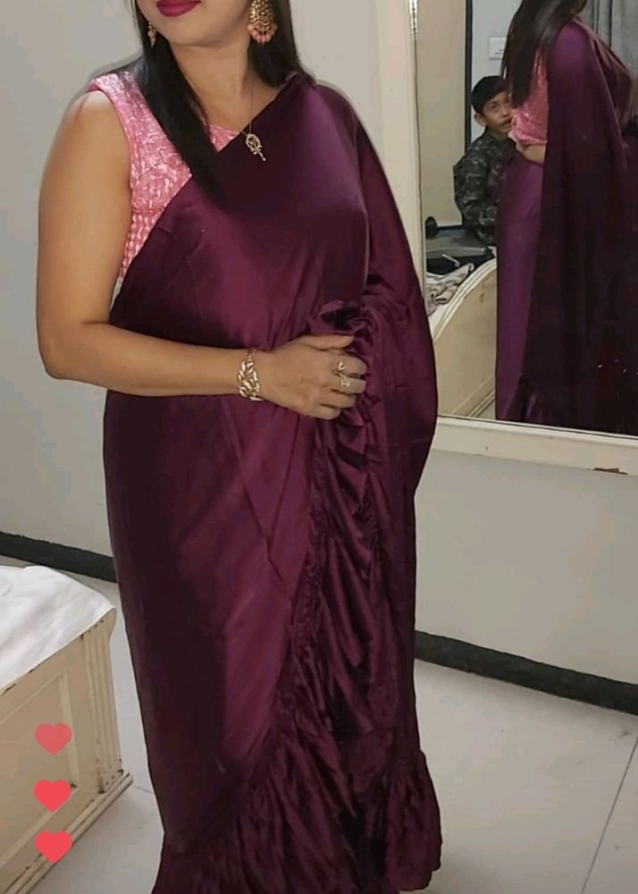 Magenta Ruffle Saree With Light Pink Blouse