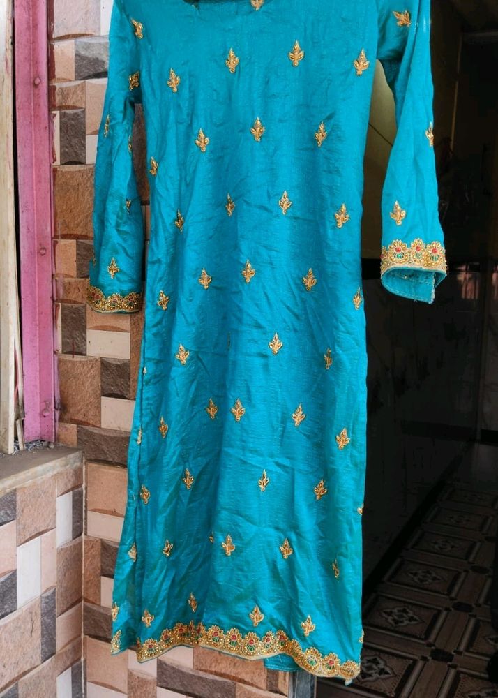 A Green Shiny Colour Kurti