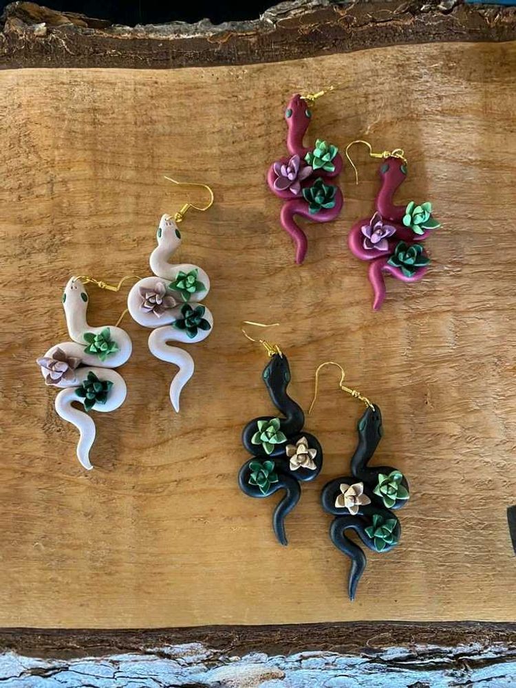 Snake Earings Each With