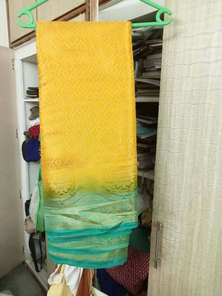 🌟🌟Yellow And Sea Green Saree