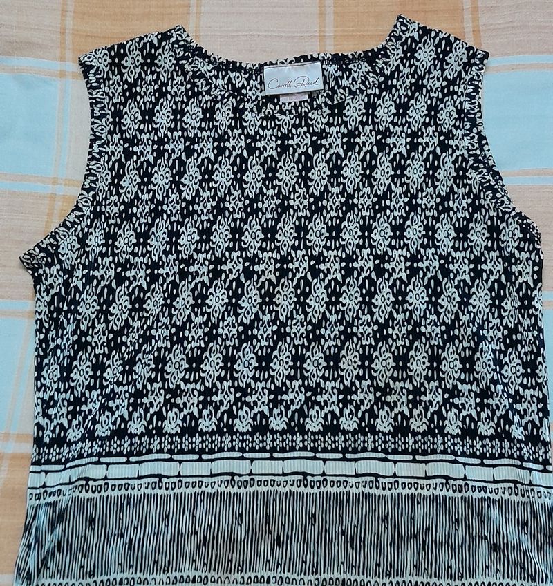 Black Top With White Imprint.